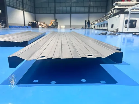 Roll-formed ESP collecting electrode plate with longitudinal stiffening ribs and punched fixing holes