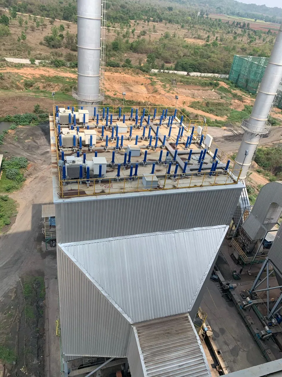 Precipitator roof — insulator housings and rapping gear
