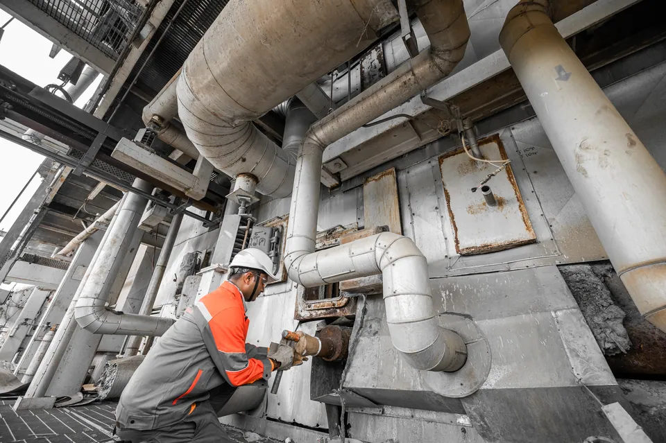 Arrow Energy technician servicing soot blower steam piping